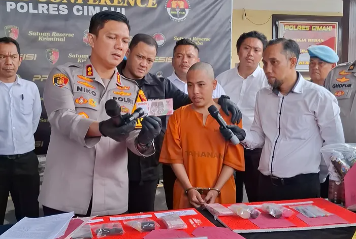 Penjual Ketan Bakar Produksi dan Edarkan Uang Palsu Lewat Media Sosial
